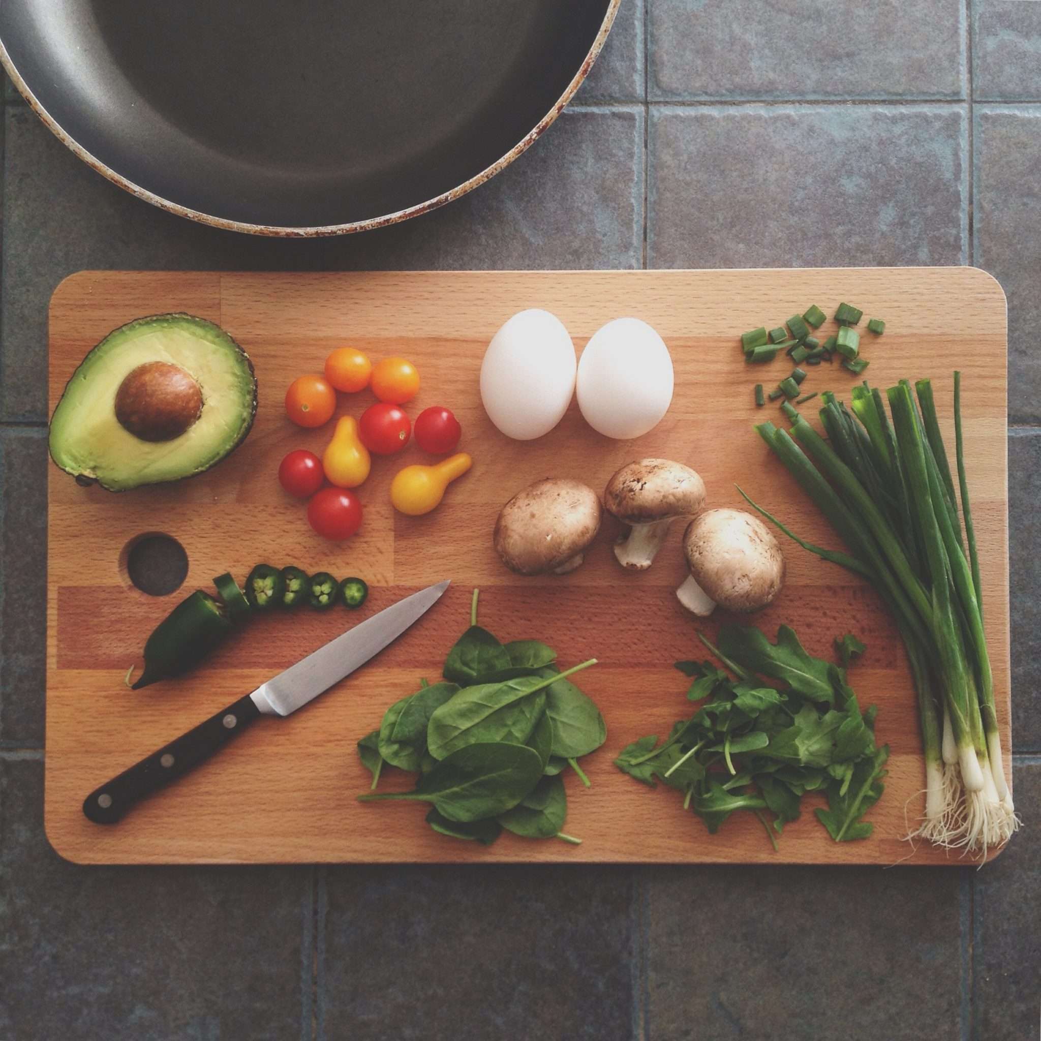 cutting board with various healthy ingredients