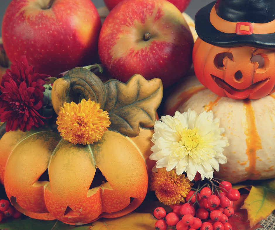 Halloween decorated pumpkins and apples